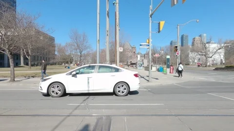 POV driving plate side view downtown Toronto city streets Stockbeeldmateriaal 150795990