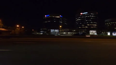 POV driving plate side view city streets on a very dark night Vídeos de archivo 154223669