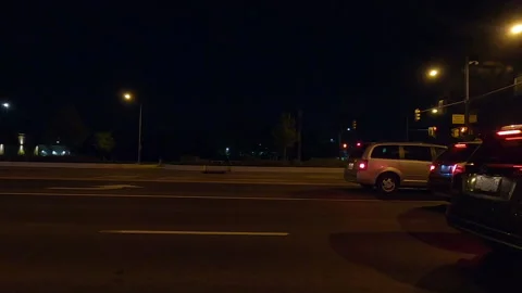 POV driving plate side view on a very dark night Stock Footage 154223884