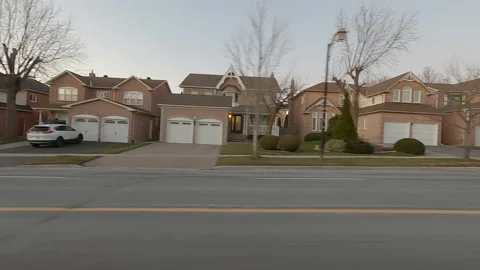 POV driving plate side view suburban city streets near Toronto Stock Footage 167301724