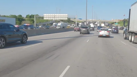 POV driving plate slow rish hour traffic on highway Stock Footage 155526019