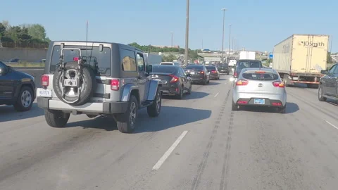 POV driving plate slow rish hour traffic on highway Stockbeeldmateriaal 155526085