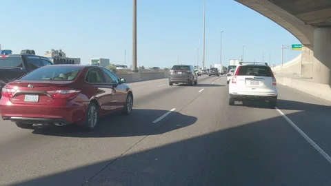 POV driving plate slow rish hour traffic on highway 库存影片 155526624