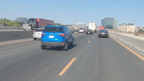 POV driving plate slow rish hour traffic on highway Vidéo 155529908