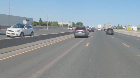 POV driving plate slow rish hour traffic on highway Stockbeeldmateriaal 155545010