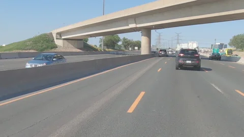 POV driving plate slow rish hour traffic on highway Vídeos de archivo 155545463