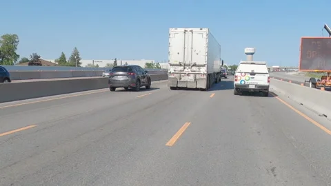 POV driving plate tractor trailer trucks on highway delivering goods 库存影片 155549832