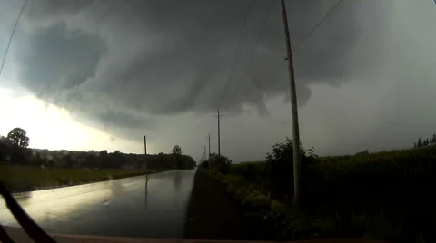 POV driving into severe thunderstorm with wall cloud forming Stock Footage 65417664