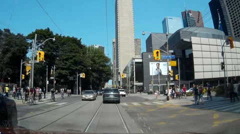 POV driving shot through downtown Toronto induding streetcars Stock Footage 40301923