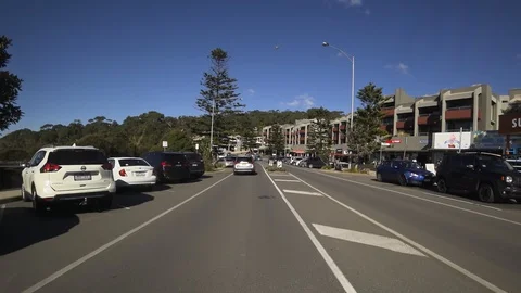 POV driving shot through Lorne on the Great Ocean Road, Victoria, Australia. Stock Footage 93115671