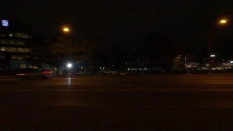POV driving side view on dark city streets at night Video stock 149471711