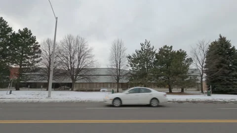 POV driving side view suburbs and suburban landscape outside city Stock Footage 146474419