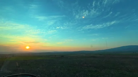 POV Driving at Sunset – Shift from Side View to Front Road, Countryside Stock Footage 331063424
