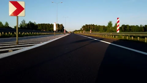 POV Driving On A Tarmac Empty Road During Sunset Stock Footage 142000549
