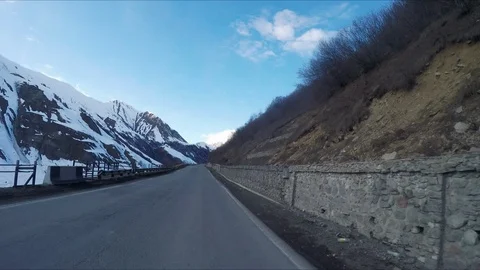 POV Driving through the gorge on a mountain road. Timelapse. Part 1 of 2 Stock Footage