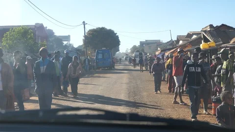 POV Driving Through Large Group Of People in Local Town, Madagascar Stock Footage 122305797