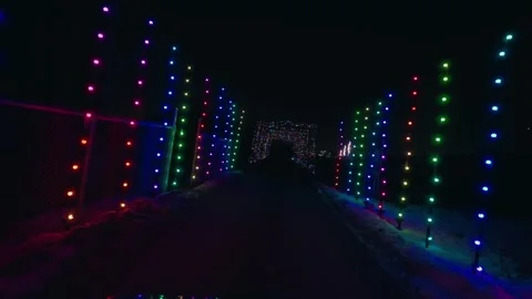 POV Driving Through Multi-Colored LED Light Tunnel at Night Stock Footage 324882148