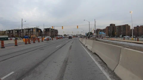 POV driving through road construction on city streets Stock Footage 98435295