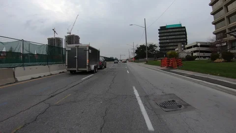 POV driving through road construction on city streets Stock Footage 98437815