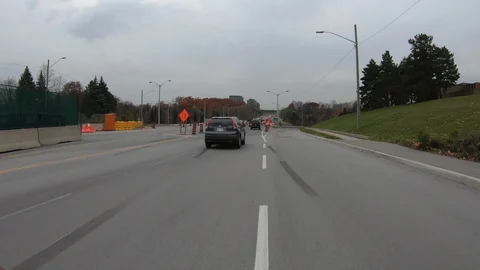 POV driving through road construction on city streets Stock Footage 98438105