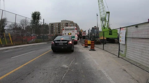 POV driving through road construction on city streets Stock Footage 98440784