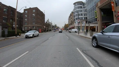POV driving through road construction on city streets Stock Footage 98442552
