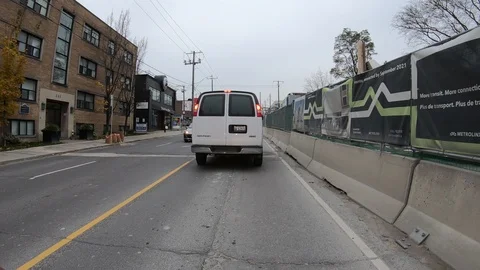 POV driving through road construction on city streets Stock Footage 98442927
