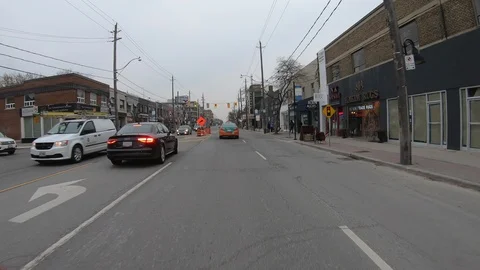 POV driving through road construction on city streets Stock Footage 98444054