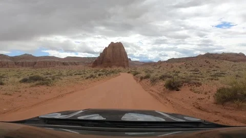 POV Driving Toward Temple of the Sun on Remote Dirt Road in Capitol Reef Nationa Stock Footage 340161856