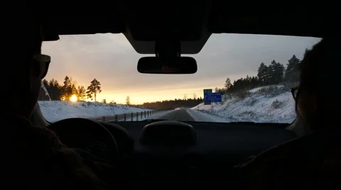 Pov driving towards the sunset Stockbeeldmateriaal 60755737