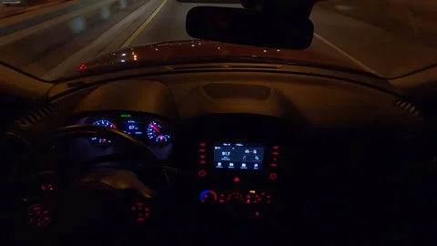 POV driving view of car dashboard windshield and road ahead Stock Footage 166860093