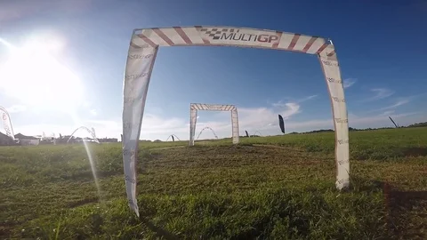 POV of a drone competition taking place on racing track Stock Footage 99050282