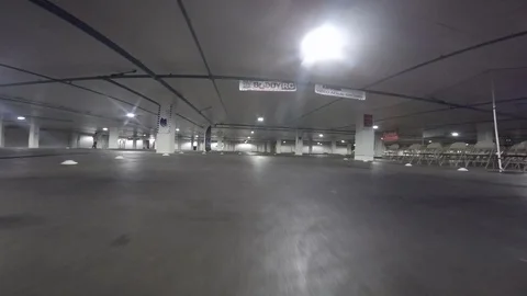 POV of a drone competition taking place in a parking lot Video stock 99050450