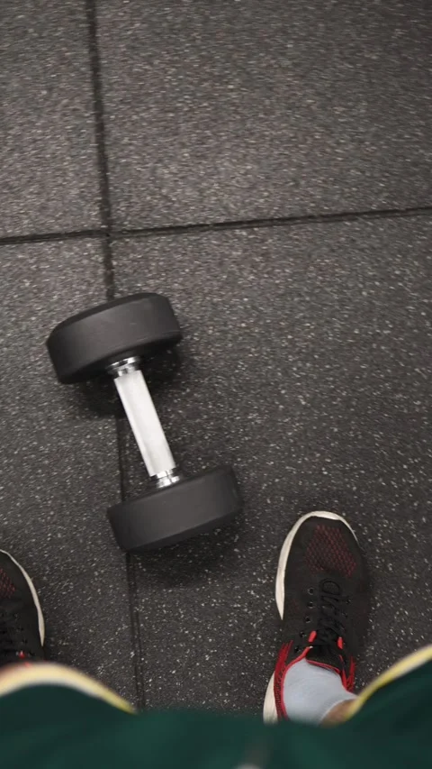 POV of dumbbell before workout Stock Footage 337346031