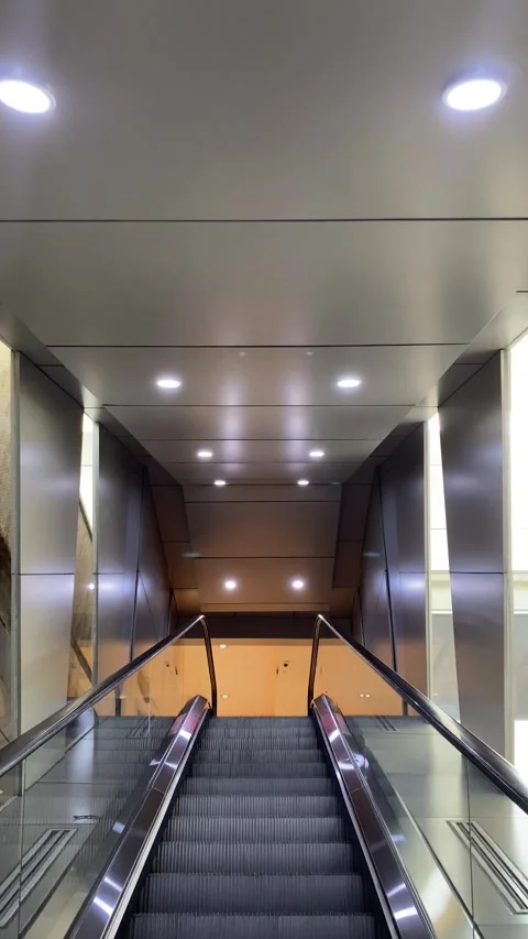 Pov empty escalator staircase Stock Footage 321924812