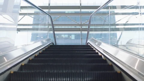 Pov empty escalator staircase moving up in airport urban metro travel corporate Stock Footage 109516149