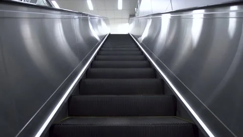 POV empty moving up escalator on public place, downtown, city, subway. Stock Footage 174418985