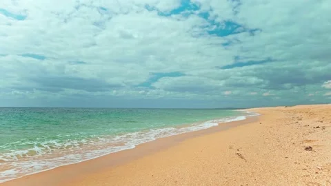 POV on empty sandy beach washed by crystal clear blue sea. 스톡 동영상 190020922
