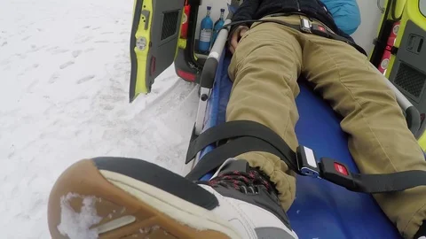 POV of EMT Loading Man on Stretcher into Ambulance Stock Footage 123692313