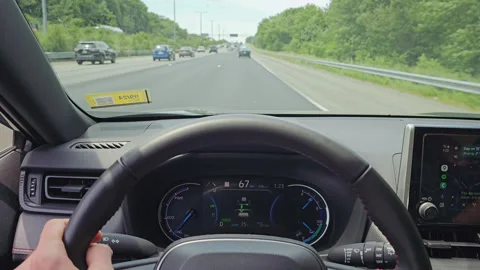POV EV or Plug-in Hybrid Driving Stock Footage 276875986
