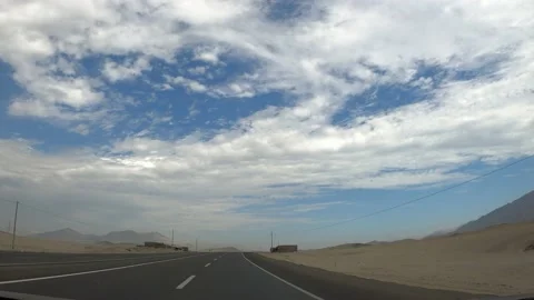 POV fast camera driving a car on the road between desert and hills and a beautif Stock-Footage 197092643