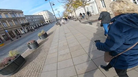 POV fast Inline skating between people on the street Stock Footage 121122966