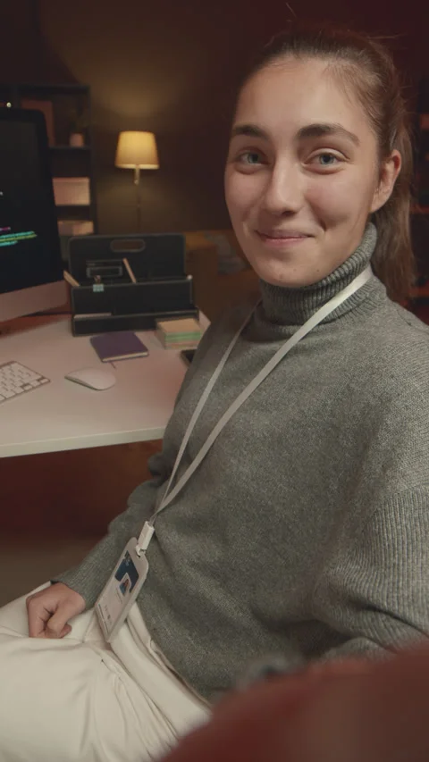 POV of Female Programmer Vlogging from Workplace at Night Stock Footage 259153688