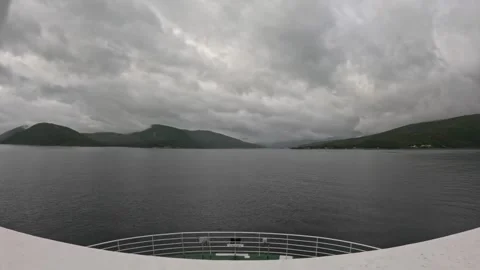 POV from ferry bow cruising through magnificent misty fjord valley in Norway Stock-Footage 341814642