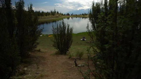 Pov first-person view arriving at the Radian lagoon surrounded by several Stock-Footage 164597452