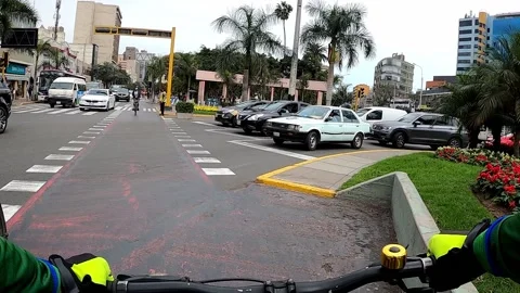 POV first-person view riding a bicycle along the Larco avenue bike path next to 스톡 동영상 160522402