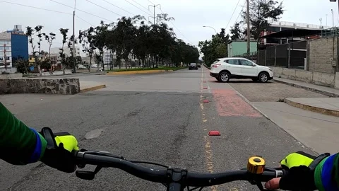 POV first person view riding a bike through the jiron morro solar next to the Stockbeeldmateriaal 161002708