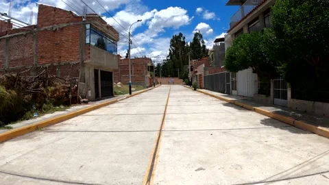 Pov first person view running down an empty street in a town in the city of Stock Footage 164589005