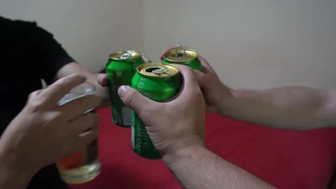 POV first person view of several hands of friends grabbing a beer can and Stock Footage 170013150