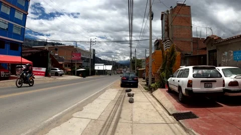 Pov first person view walking after running on the road in Huaraz looking at the Video stock 164586906
